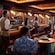Guests enjoying beverages at the Buccaneer Bar on board the Disney Adventure